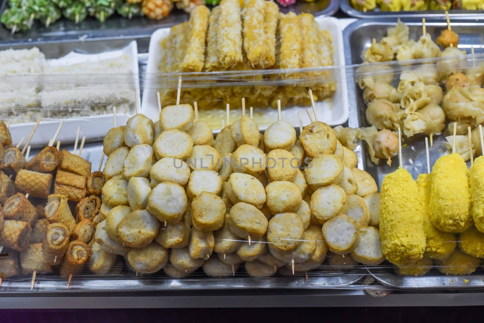 Many snacks and seafood in vietnamese night market in food festival