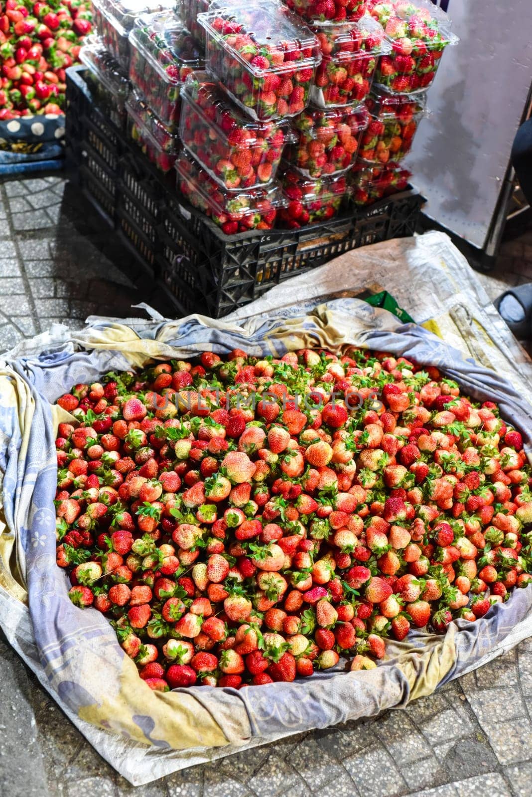 Many fresh natural strawberry in vietnamese night market in Da Lat