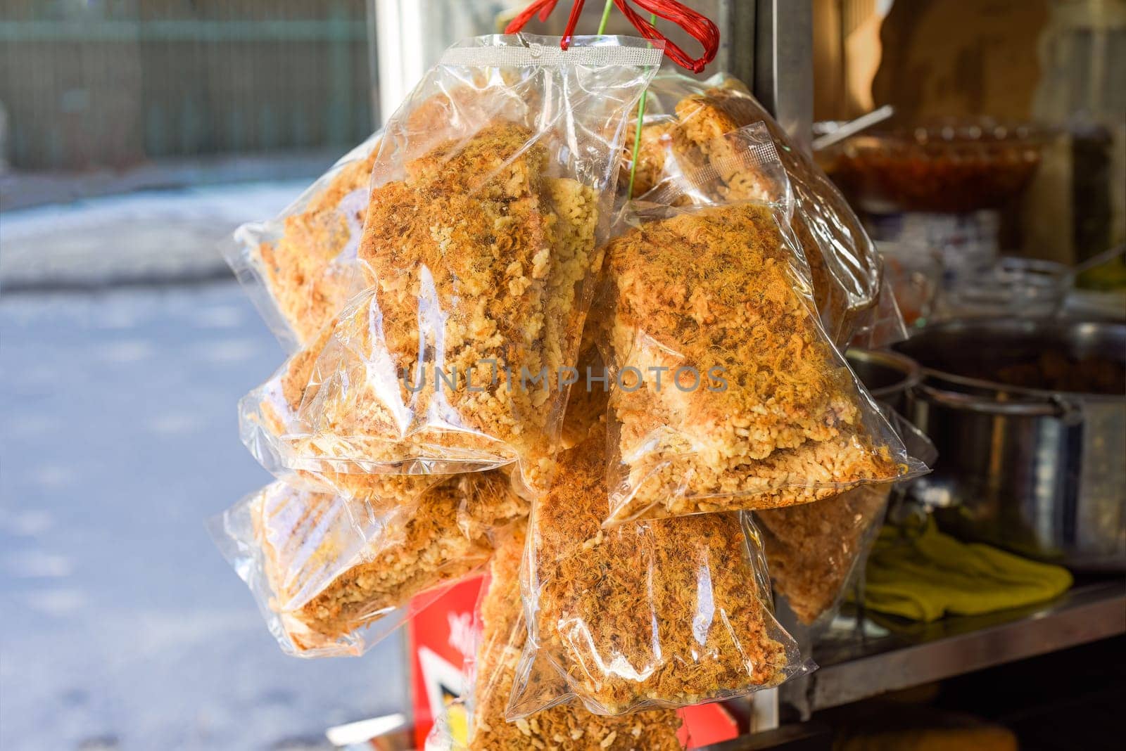 Vietnamese traditional Com Chay made of rice and with Rousong (meat floss with eggs and fish sauce) on street food in Nha Trang