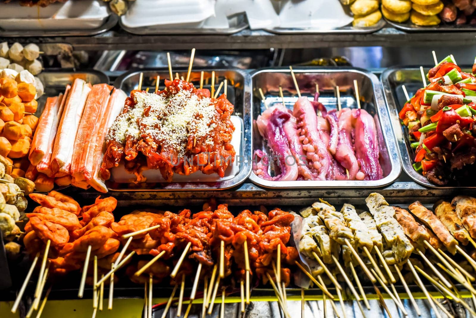 Many snacks and seafood in vietnamese night market in Da Lat