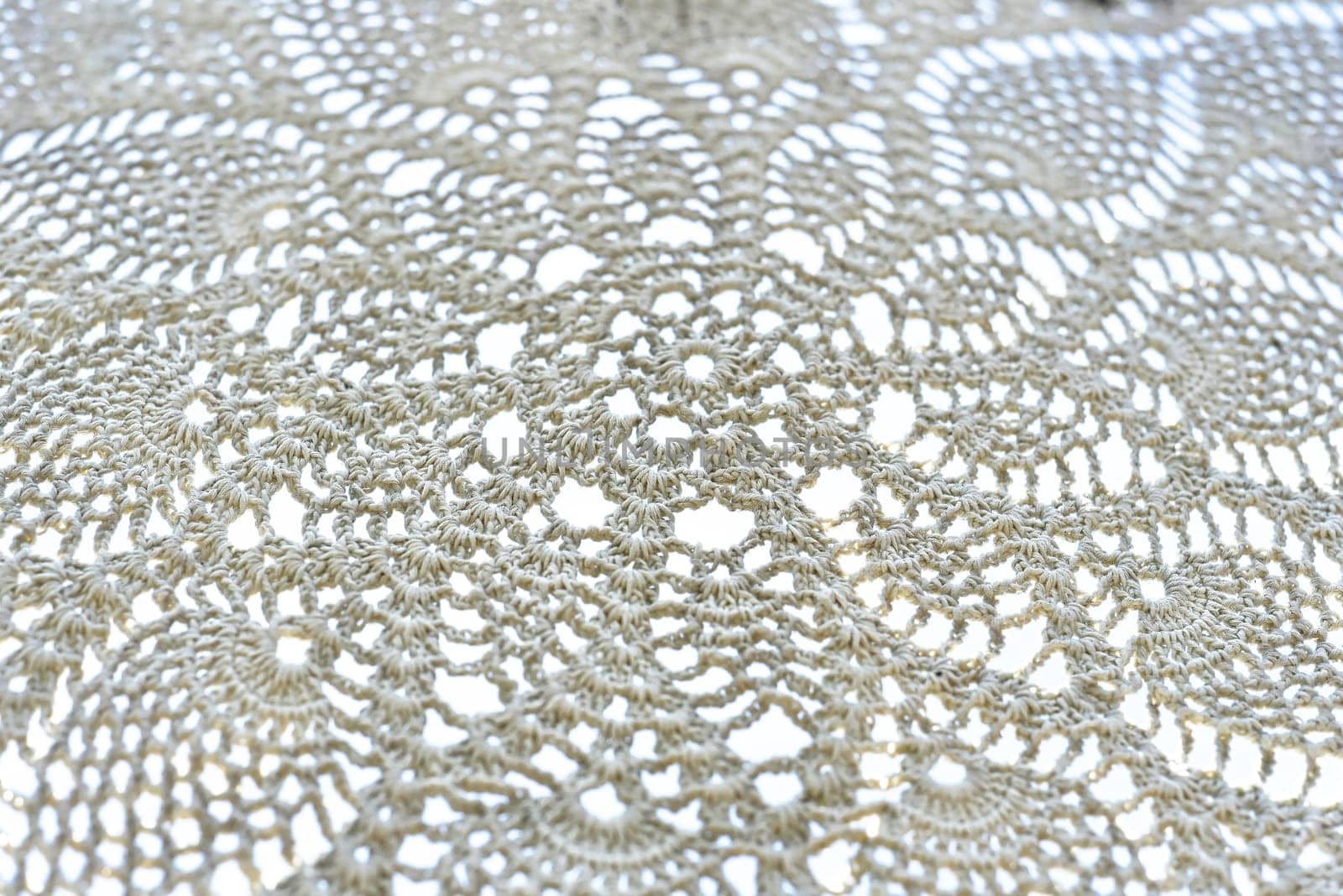 Various knots of macrame technique made of white threads
