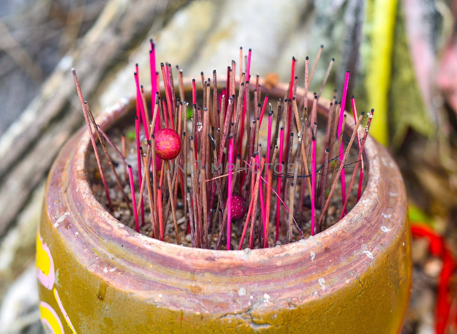 Senko candles smoldering in Vietnamese Buddhist temple