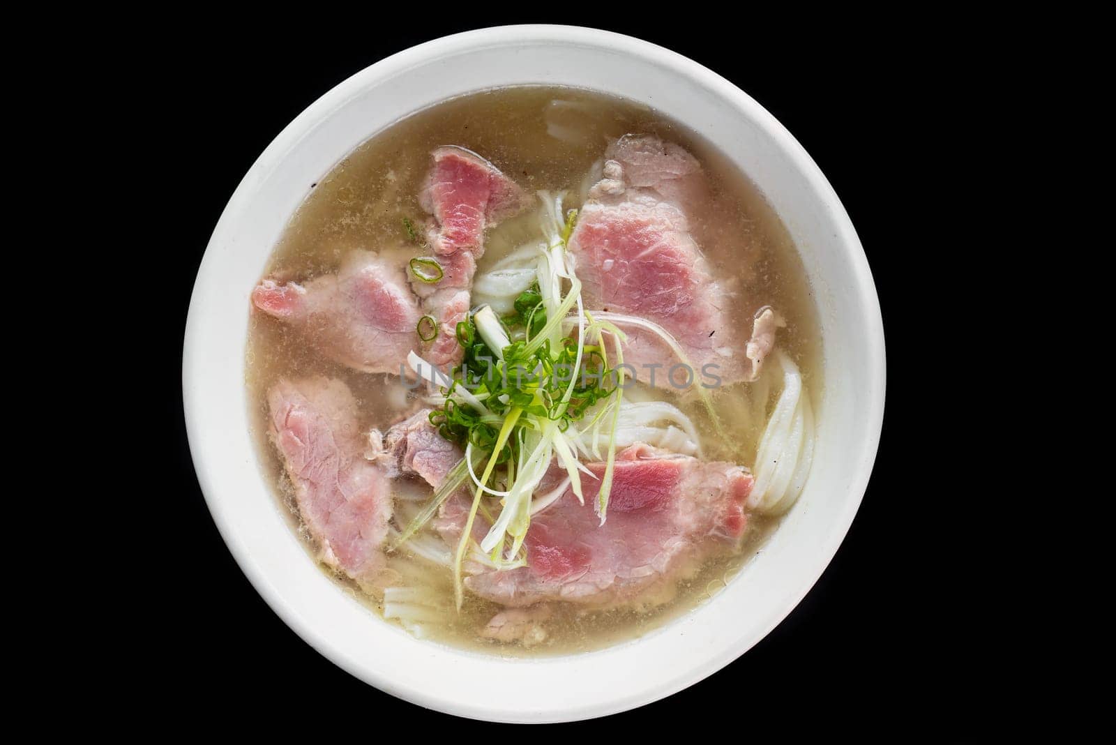 Traditional vietnamese soup Pho bo on black background