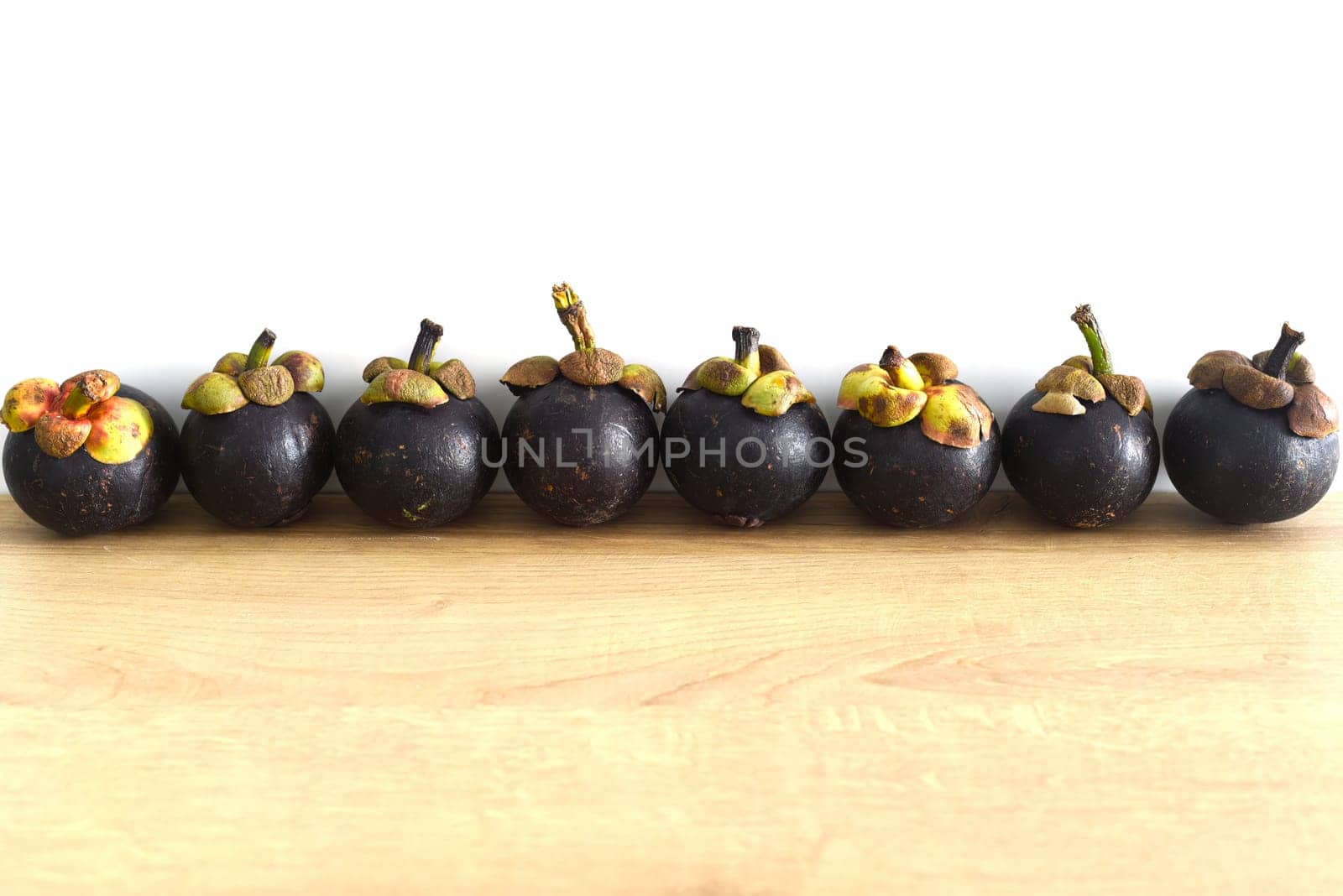 Mangosteen (Garcinia mangostana), also known as the purple mangosteen