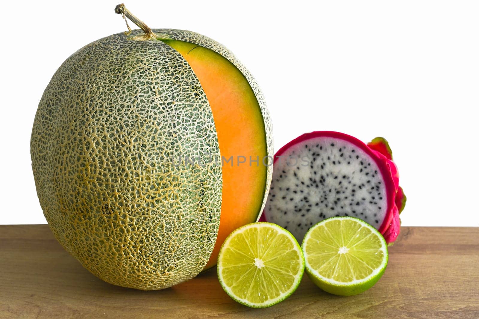 Vietnamese fruit on wooden table against white background