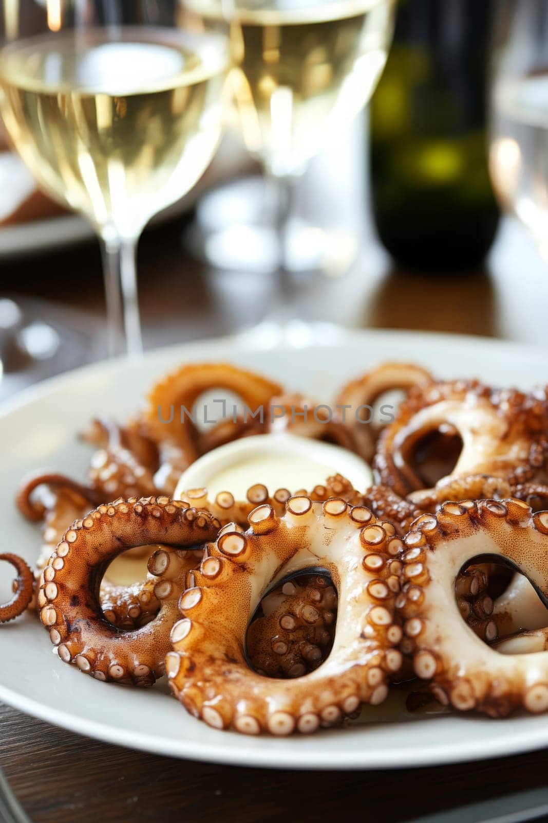 Fried octopus on a plate and a glass of wine. selective focus. Generative AI, food