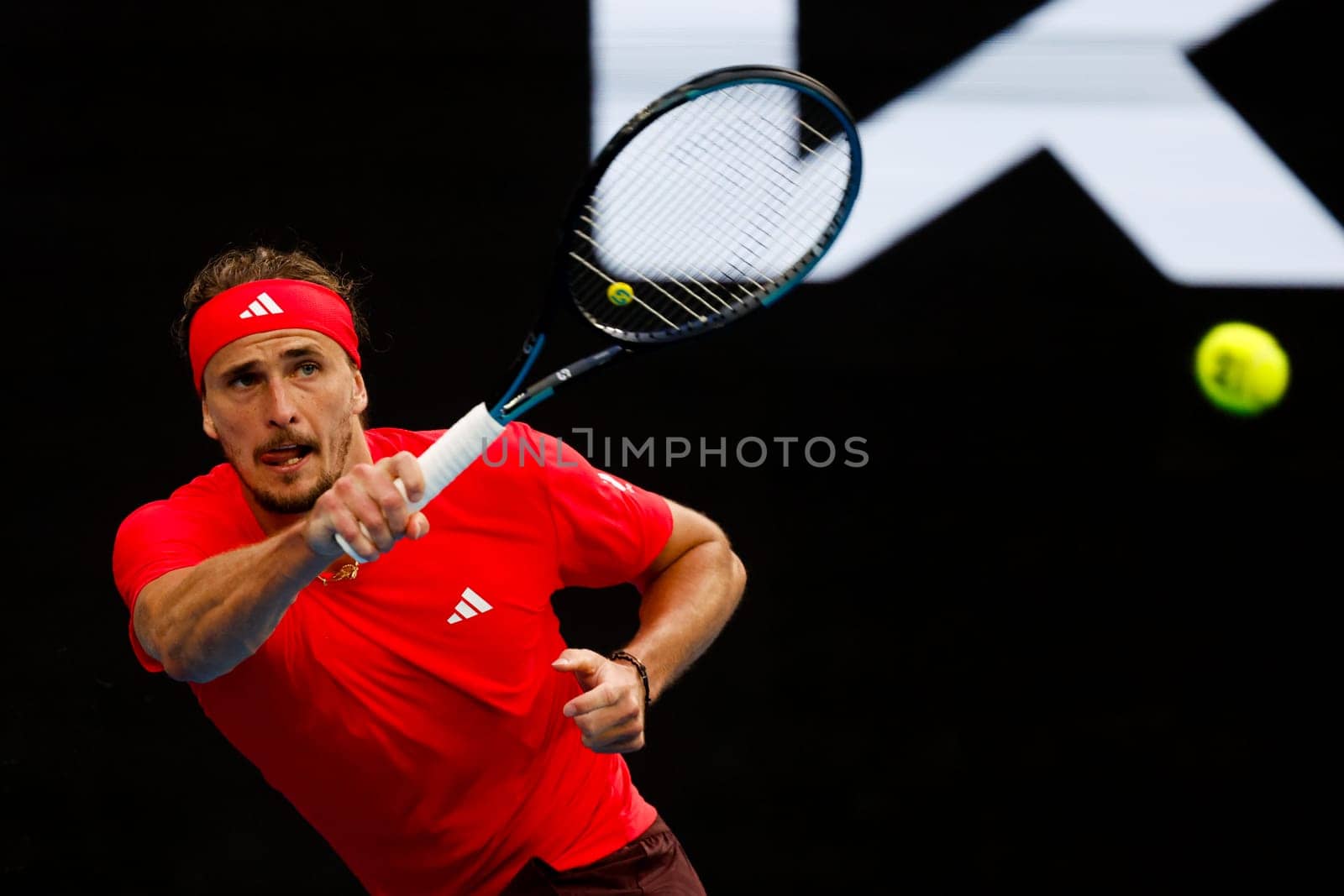 MELBOURNE, AUSTRALIA - JANUARY 19: Alexander Zverev of Germany hits a forehand to Ugo Humbert of France on day eight of the 2025 Australian Open at Melbourne Park on January 19, 2025 in Melbourne, Australia.