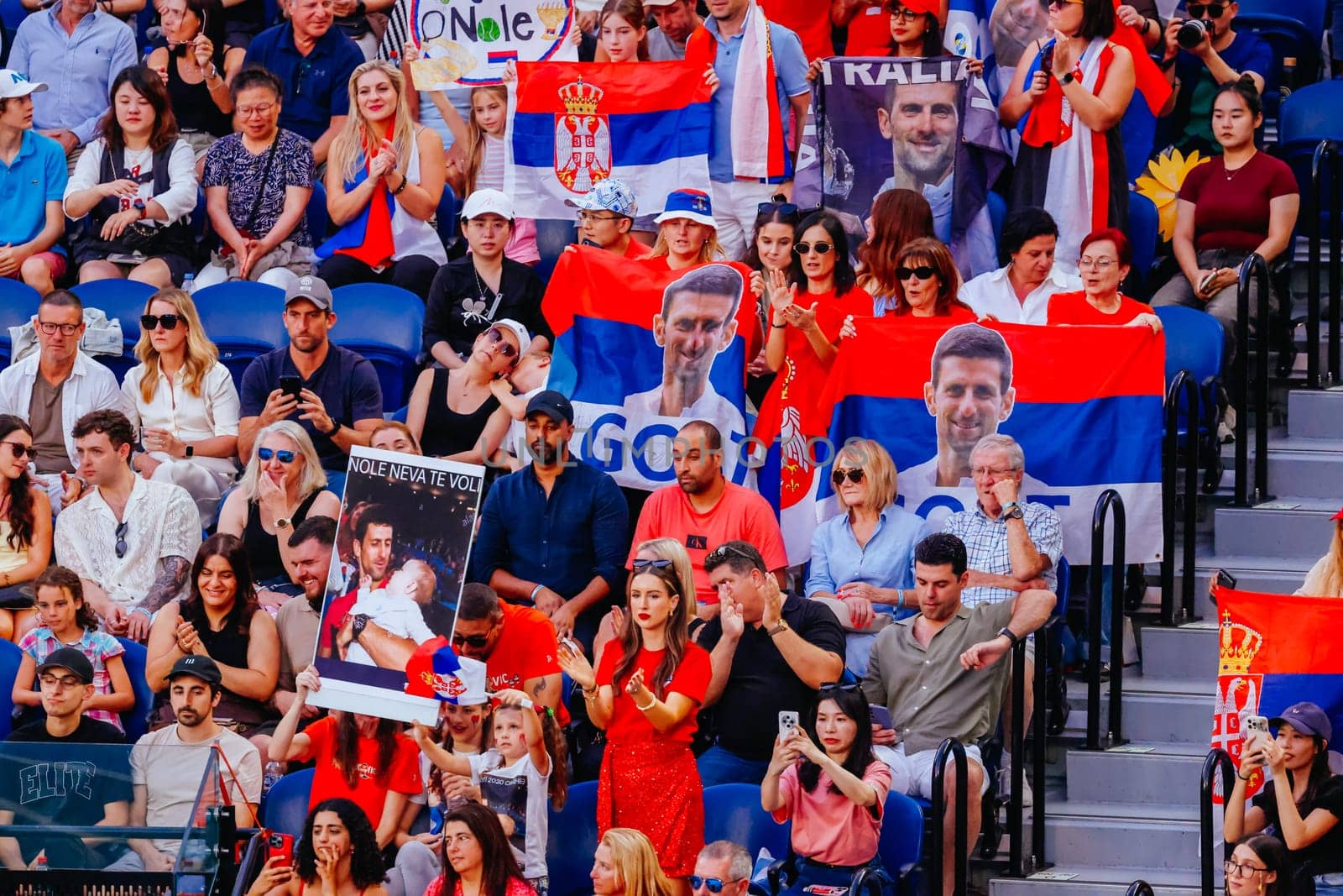 MELBOURNE, AUSTRALIA - JANUARY 19: Serbian fans cheer as Novak Djokovic of Serbia plays Jiri Lehecka of Czech Republic on day eight of the 2025 Australian Open at Melbourne Park on January 19, 2025 in Melbourne, Australia.