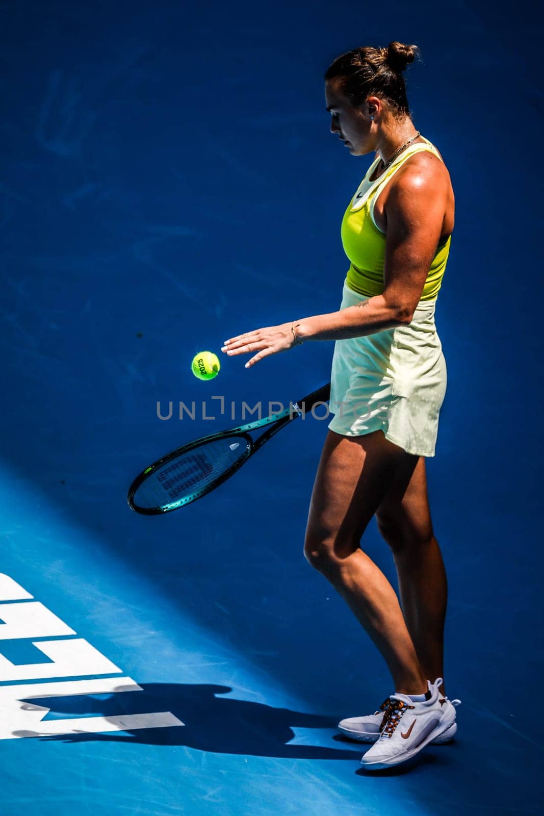 MELBOURNE, AUSTRALIA - JANUARY 19: Aryna Sabalenka of Belarus serves to Mirra Andreeva of Russia on day eight of the 2025 Australian Open at Melbourne Park on January 19, 2025 in Melbourne, Australia.