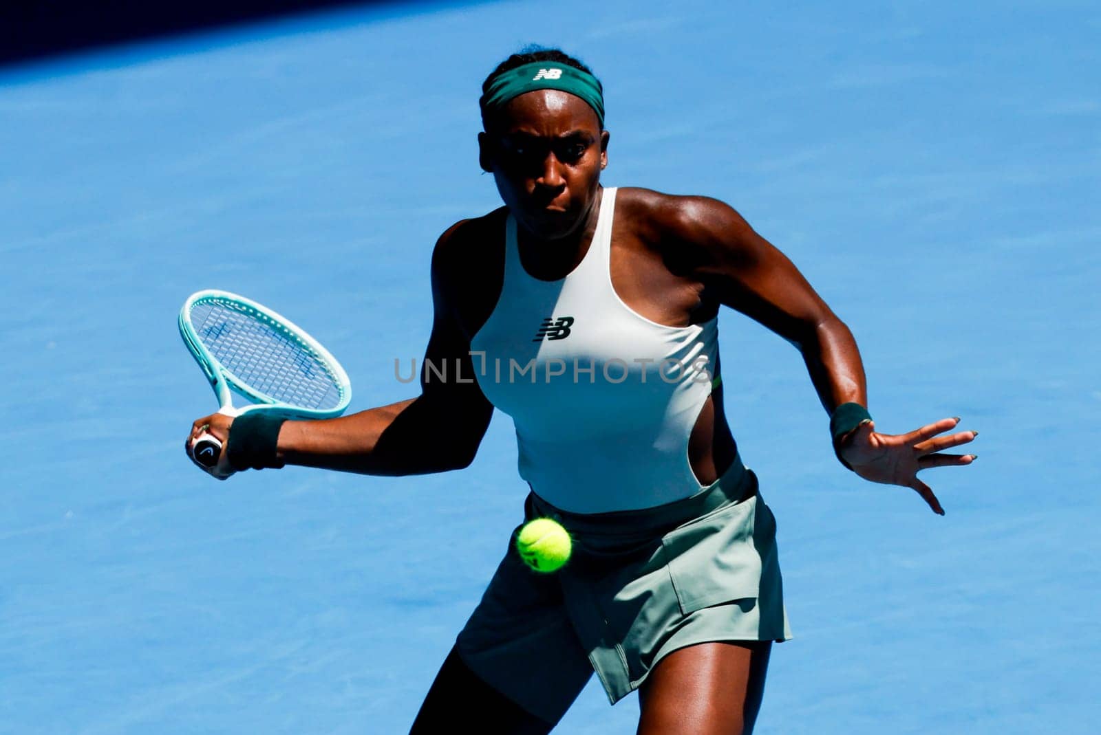MELBOURNE, AUSTRALIA - JANUARY 19: Coco Gauff of USA hits a forehand to Belinda Bencic of Switzerland on day eight of the 2025 Australian Open at Melbourne Park on January 19, 2025 in Melbourne, Australia.