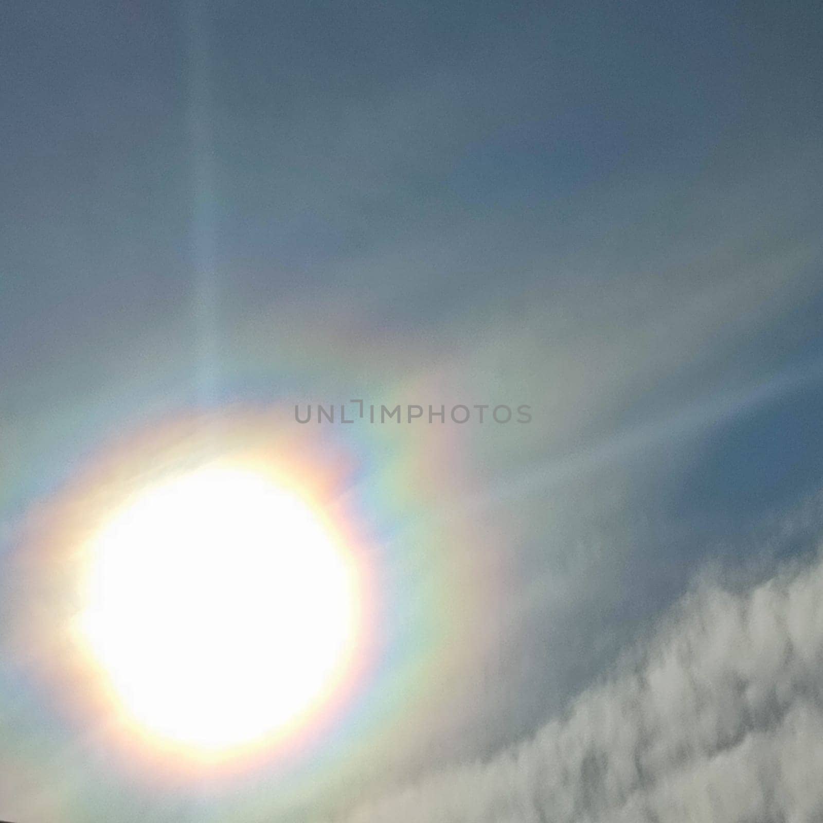 Sun lights white blue sky nature background clouds . High quality photo