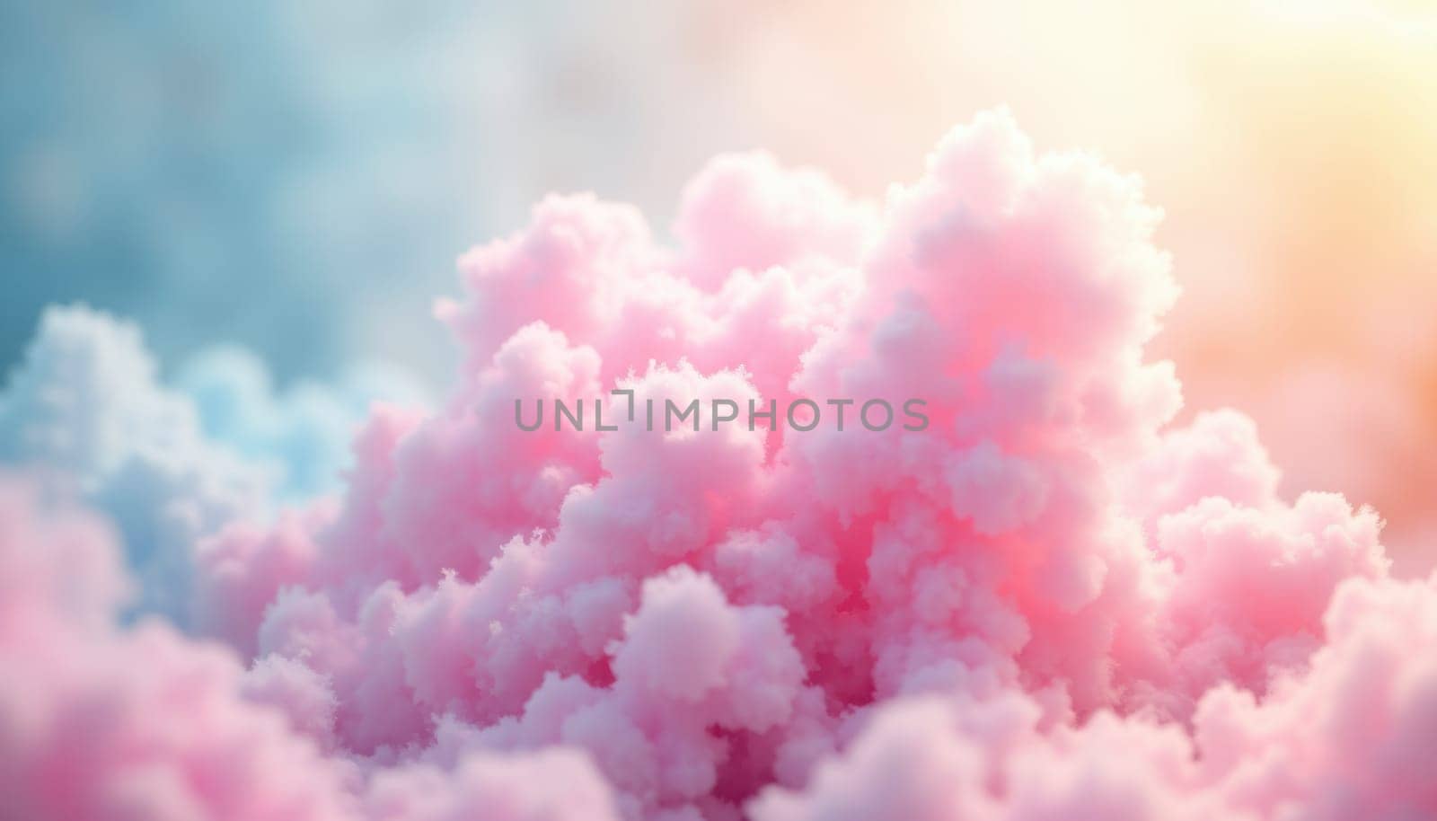 A fluffy pink cloud with a blue sky background. The cloud is full of pink and blue colors