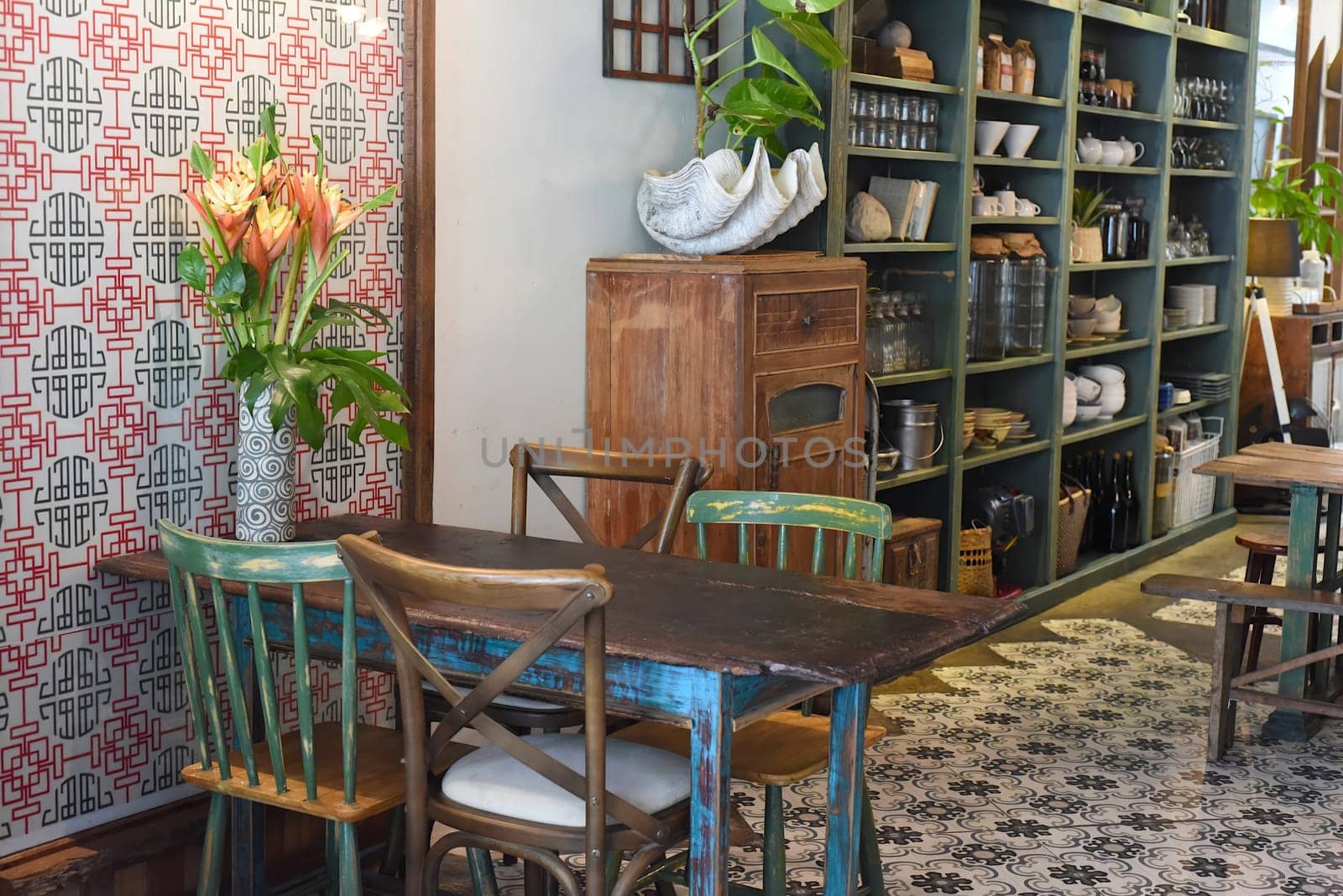 Loft style with wooden furniture in a Vietnamese coffee shop