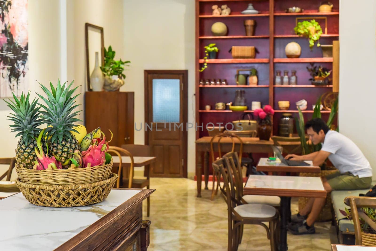Loft style with wooden furniture in a Vietnamese coffee shop
