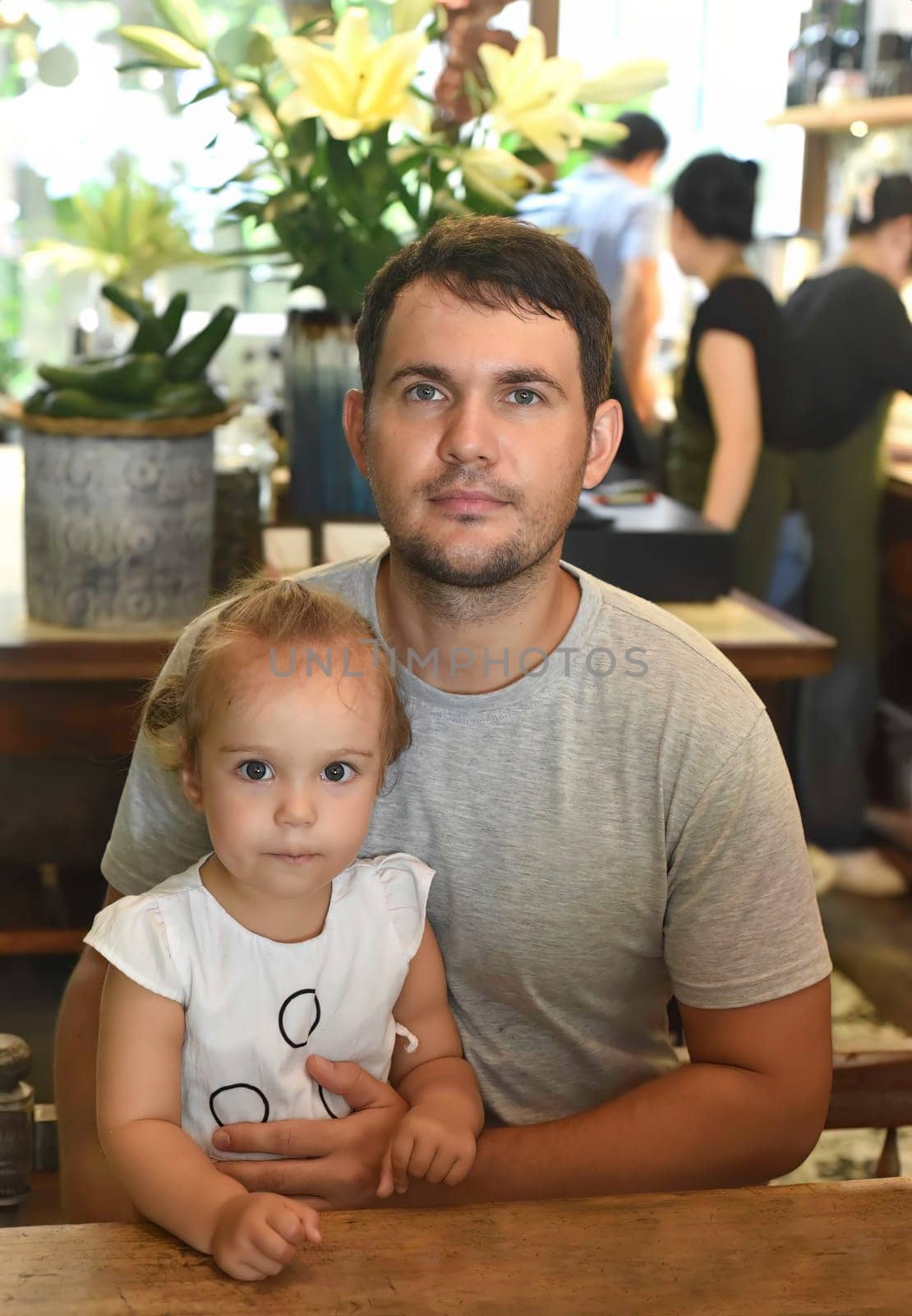 Young father with a little daughter