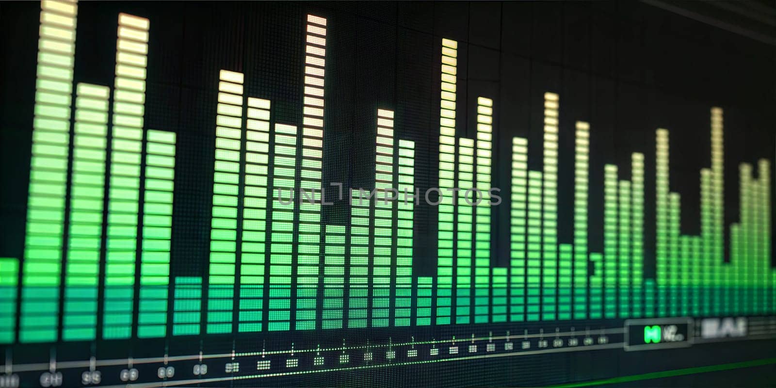 A detailed digital representation of audio frequencies with green-colored bars, showing sound wave patterns and frequencies displayed in Hz on a black background.