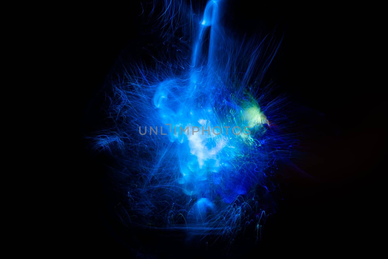 Blue Light energy explosion with elegant glowing lines. Abstract technology background. High quality photo