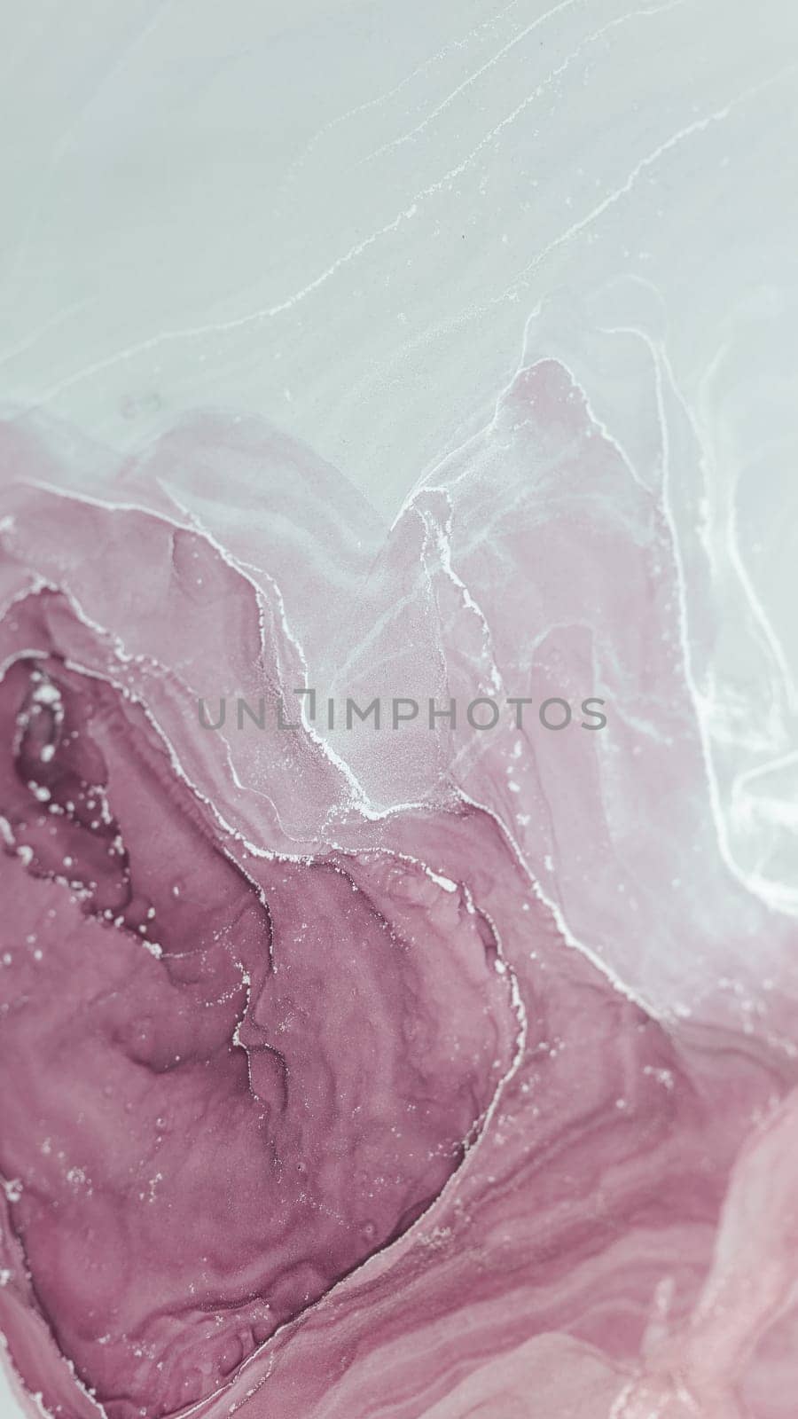 This piece features an intricate blend of alcohol inks, showcasing soft pinks and whites that flow seamlessly together. The delicate patterns evoke a sense of calm and elegance.