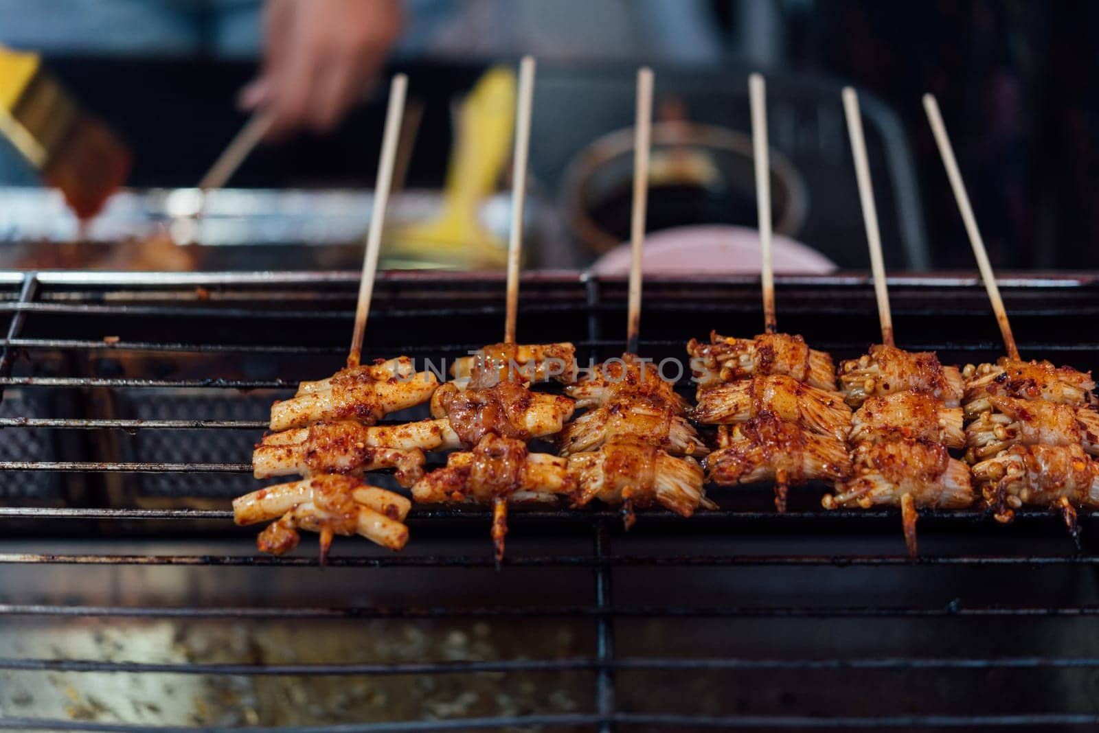 Mala is Grilled meat (Beef, Pork, Chickens or Mushroom) with chilli sauce and chinese hot spicy herb (Sichuan Pepper) for sale at Thai street food market or restaurant in Bangkok Thailand