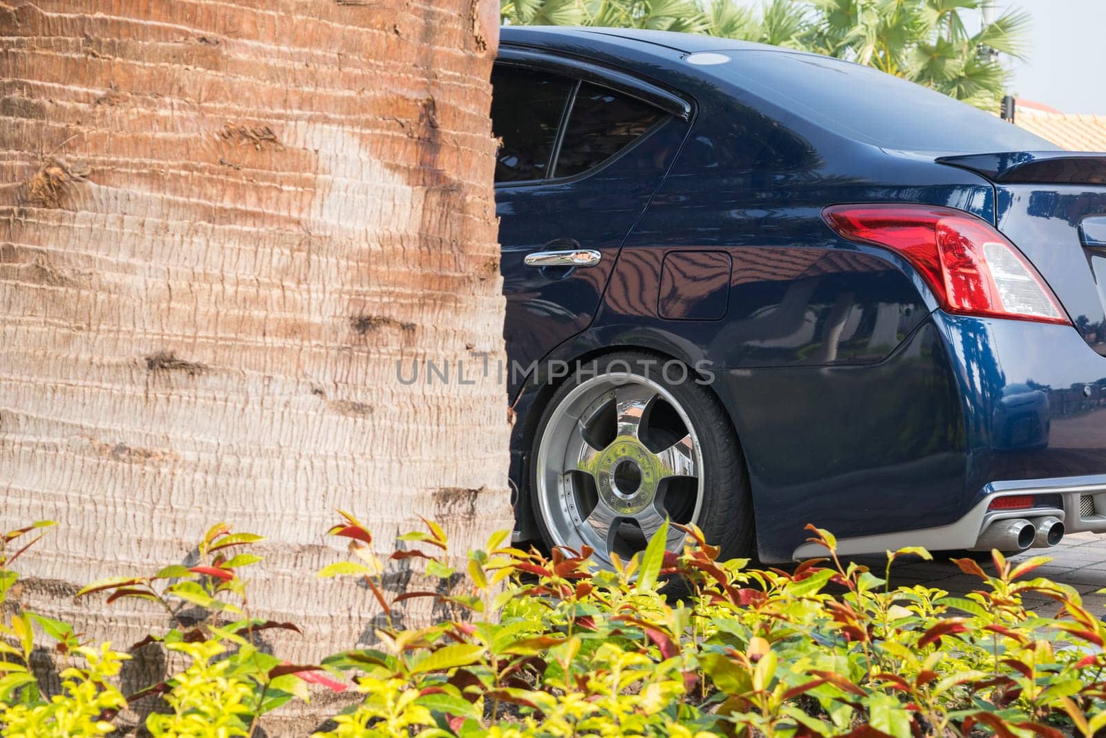 Sedan car blue color in lowered VIP style car at car parking