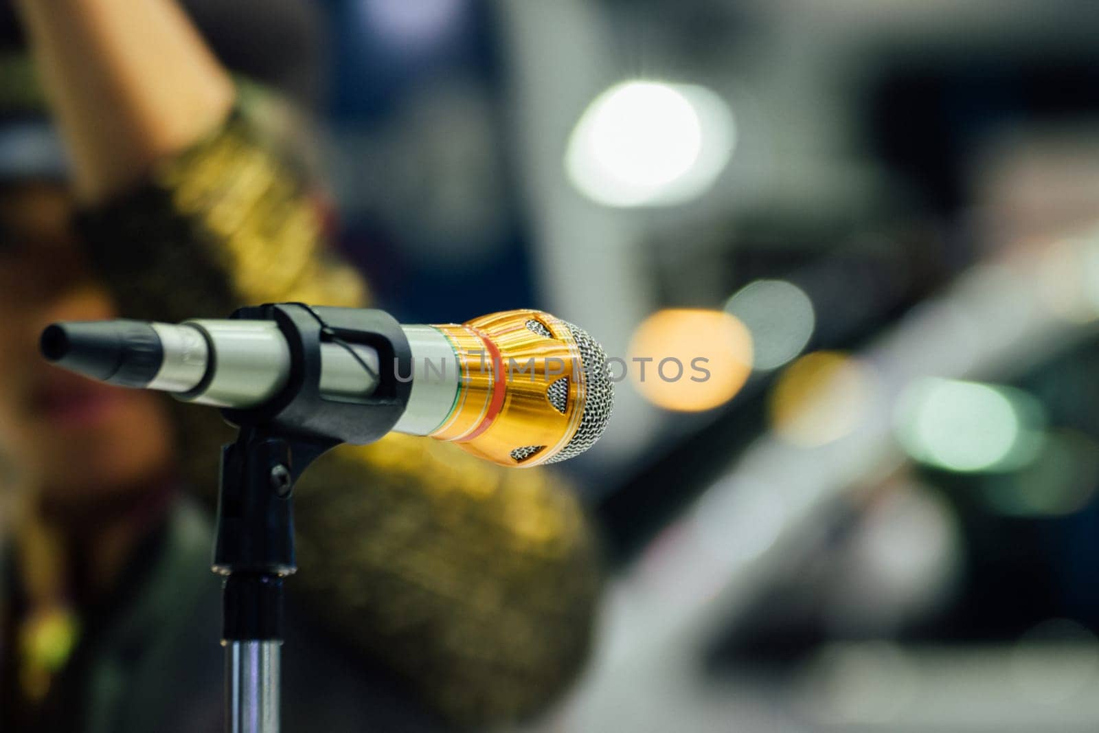 Microphone in seminar event or meeting room use mic for sound amplify when talk or communicate on stage defocus on meeting room background