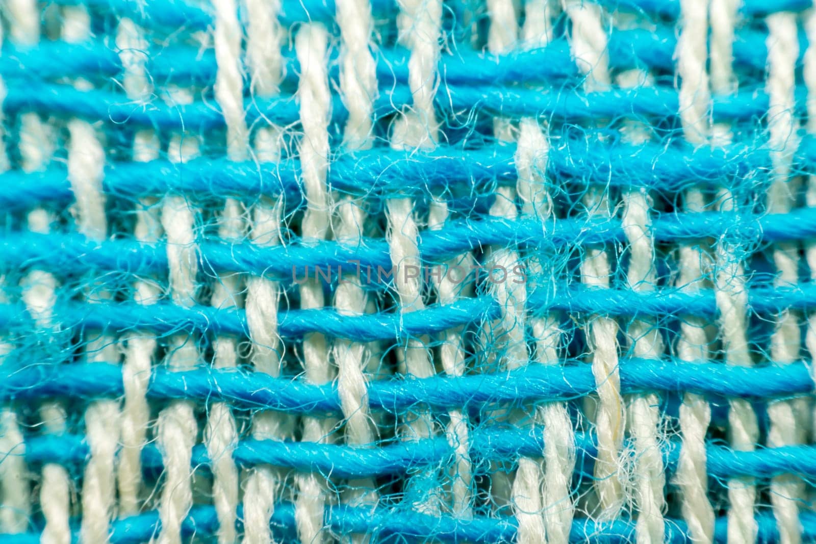 Macro of fabric weave texture surface blue and white color use for background
