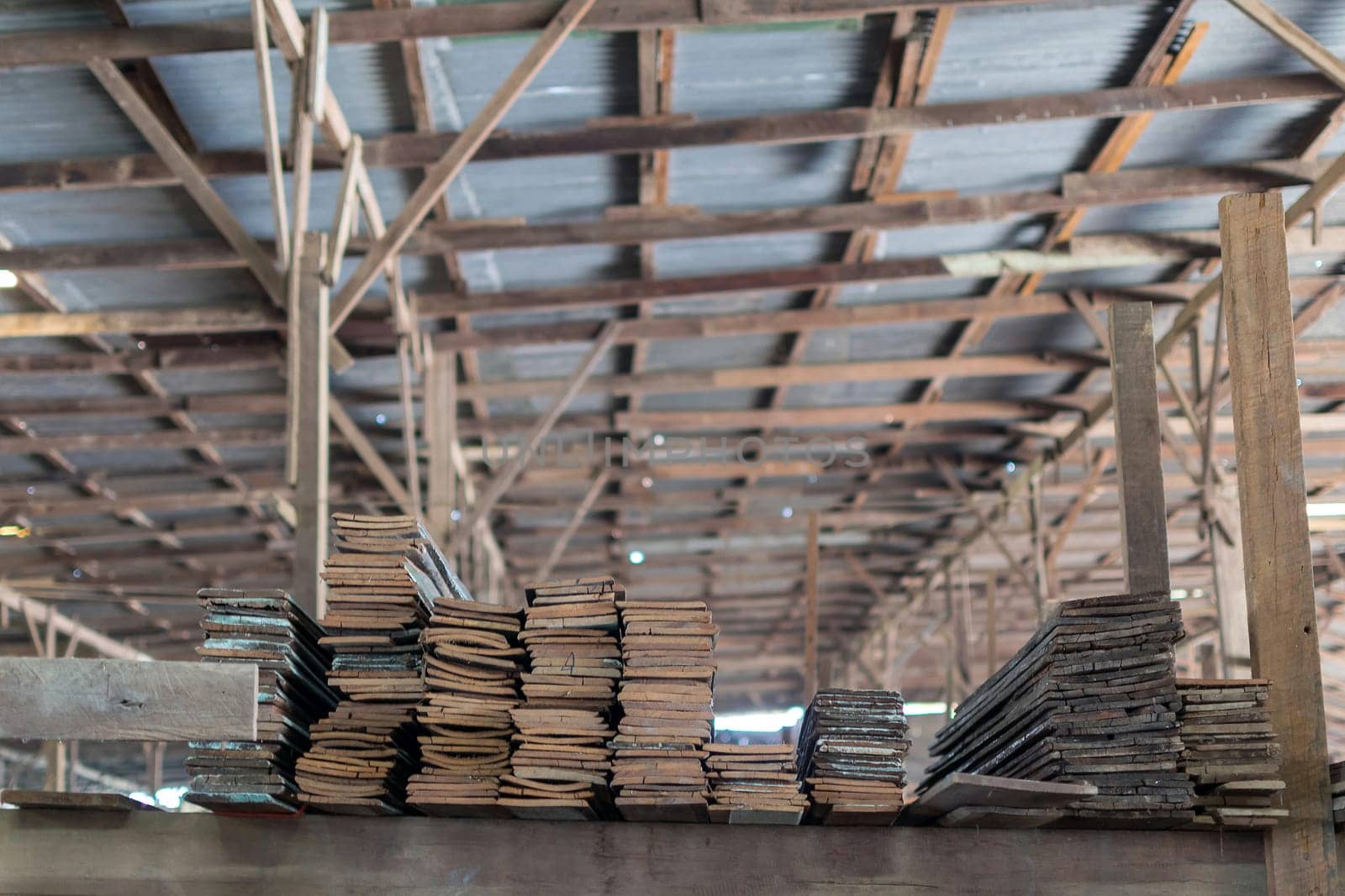 Slat and Timber wood from natural hardwood in warehouse for a construction