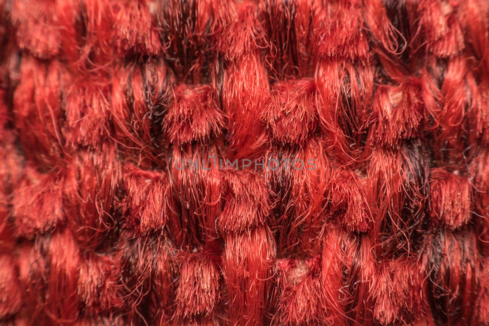 Macro of fabric weave texture surface red or pale orange color use for background