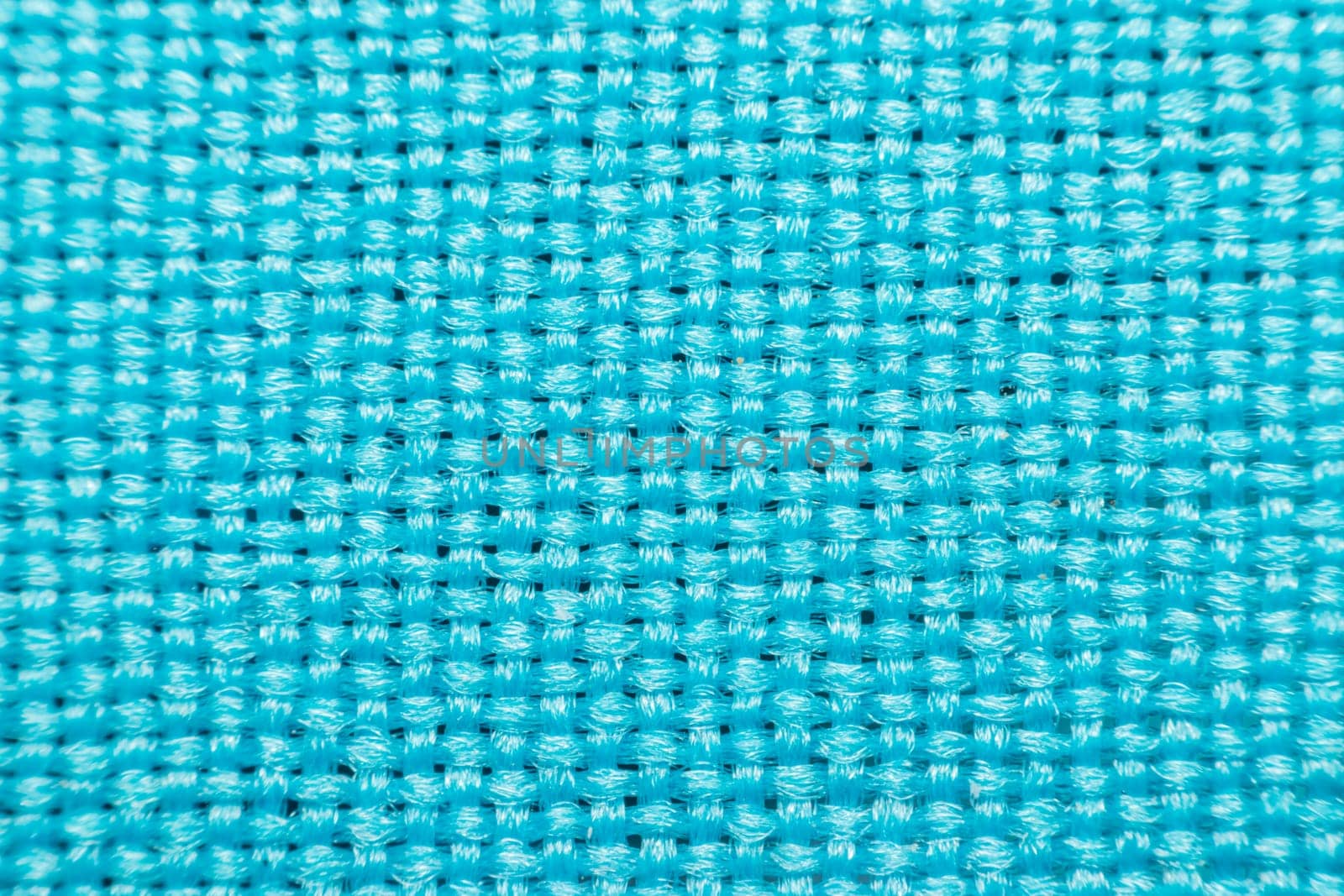Macro of fabric weave texture surface blue or indigo blue color use for background