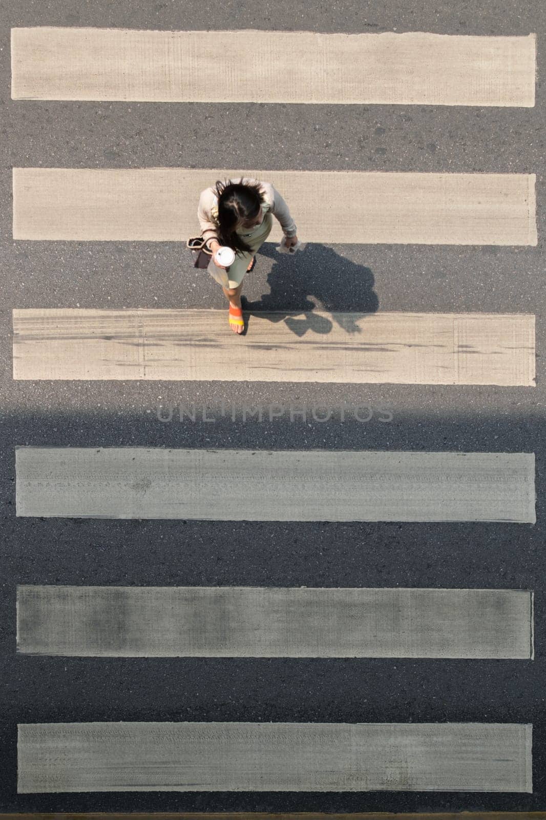 Crosswalk or Zebra crossing in Bangkok city. Bangkok is the capital and the most populous city of Thailand.