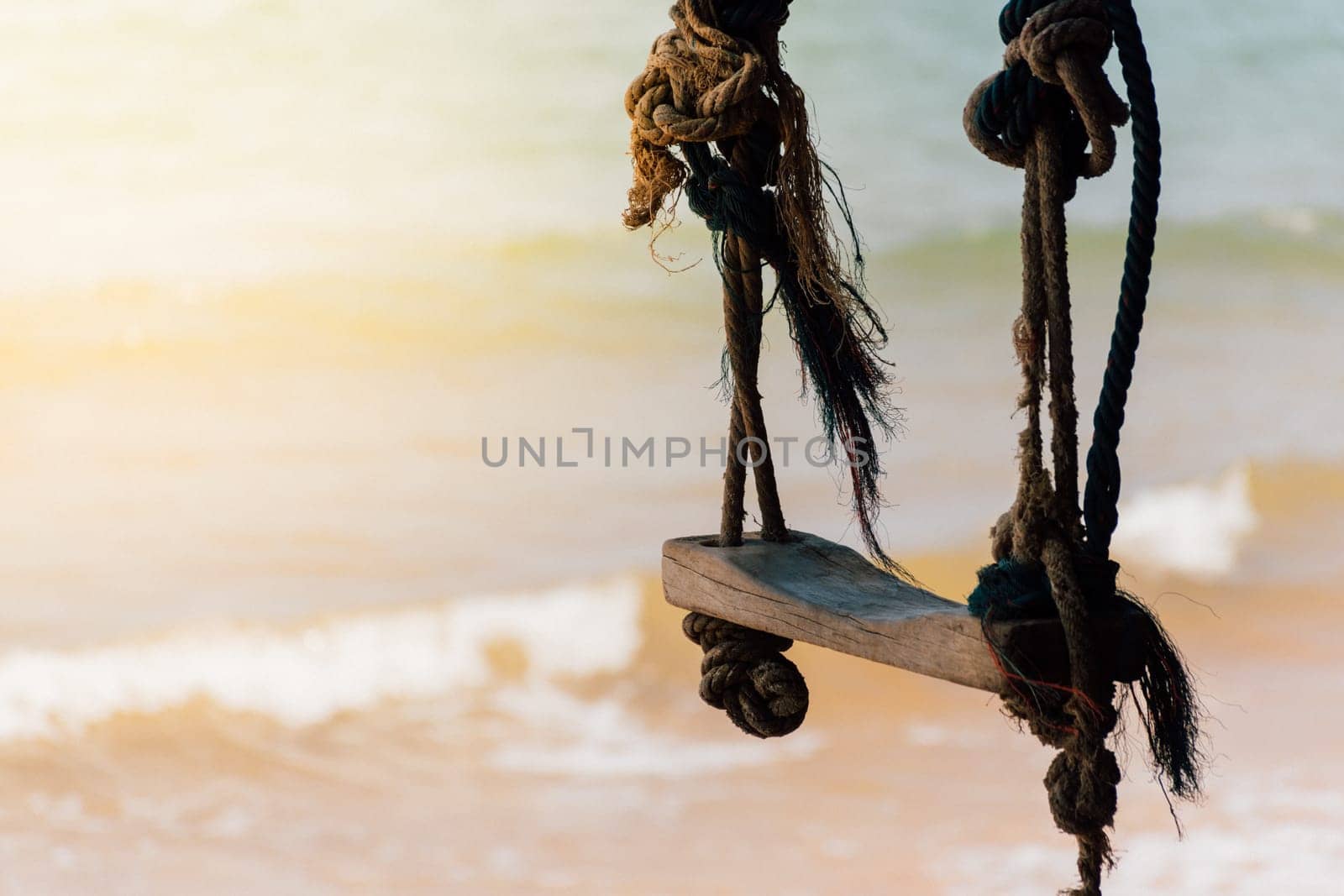 Landscape of travel place with nature at a beach and tropical sea with blue sky and have a outdoor swing use for relax in happy vacation