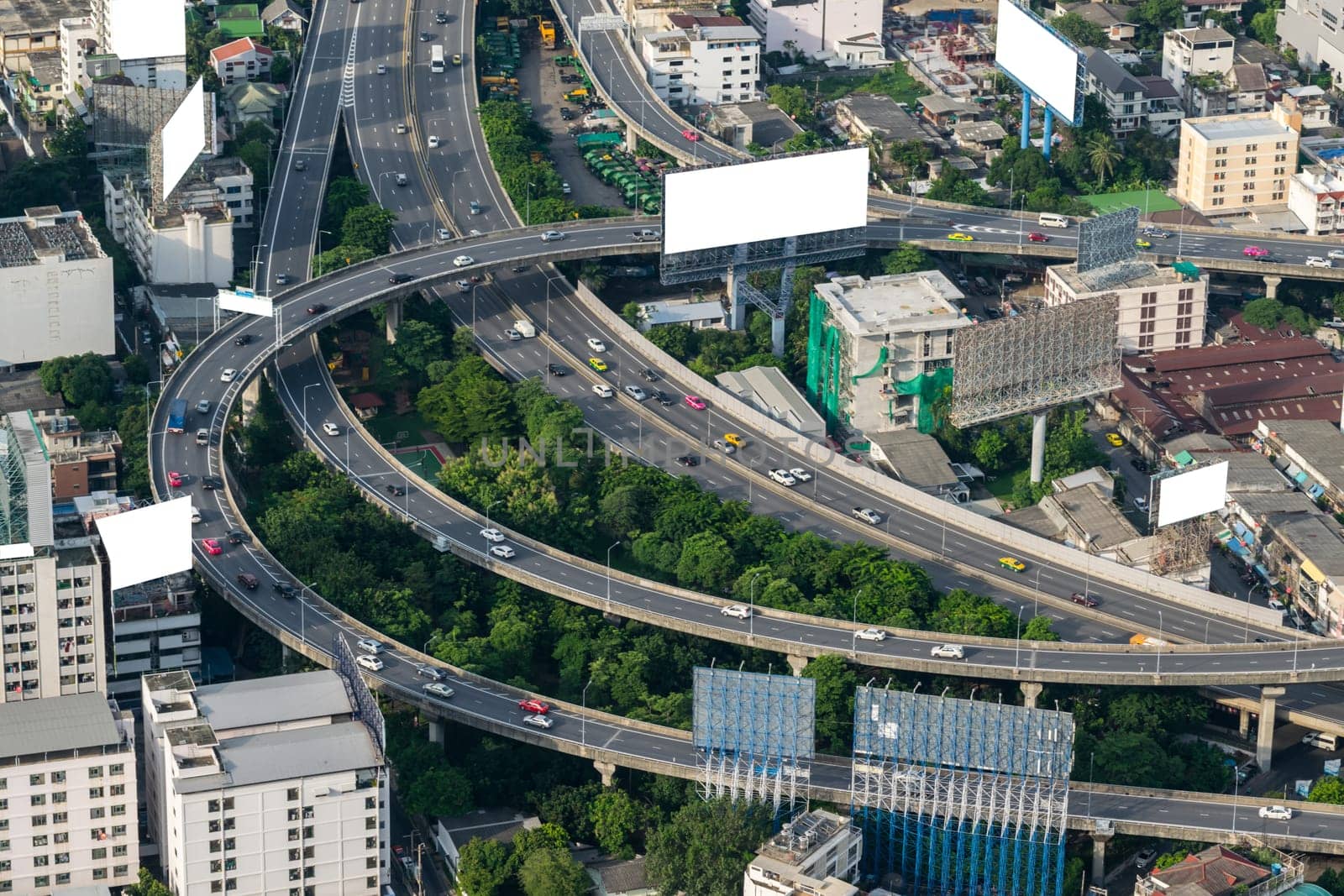 Cityscape and transportation with expressway and traffic in daytime from skyscraper of Bangkok. Bangkok is the capital and the most populous city of Thailand.