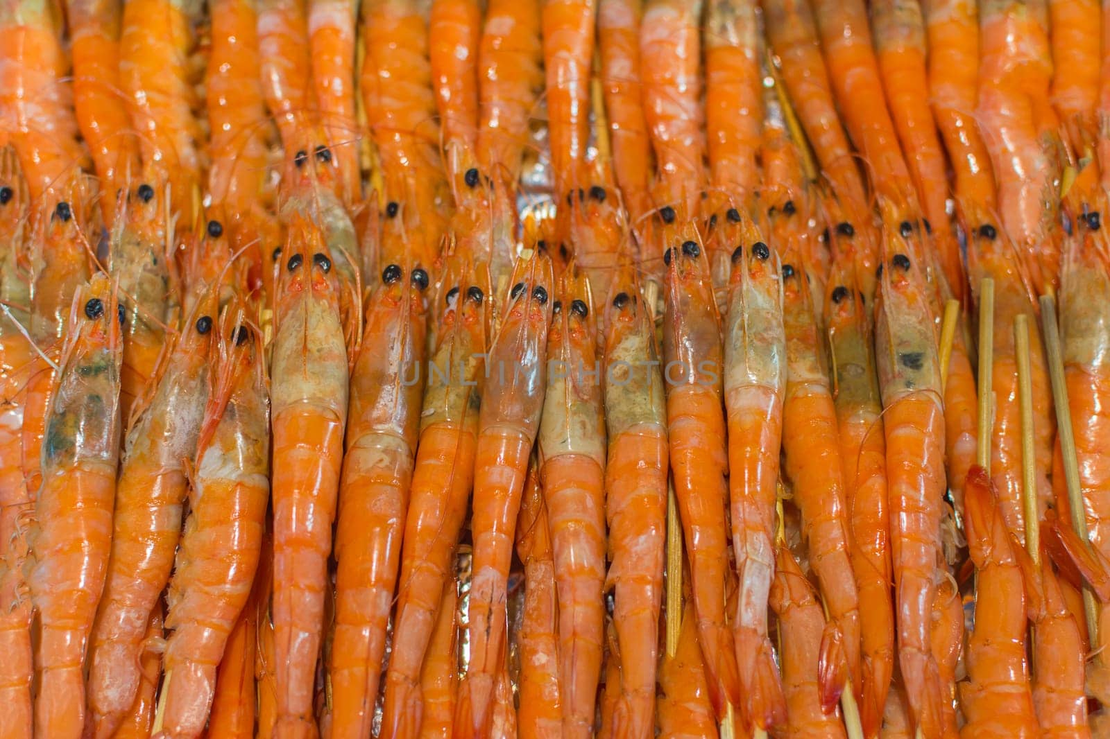 Shrimp wait for cooking to grill (Giant freshwater prawn)  in BBQ. yakiniku grill buffet restaurant