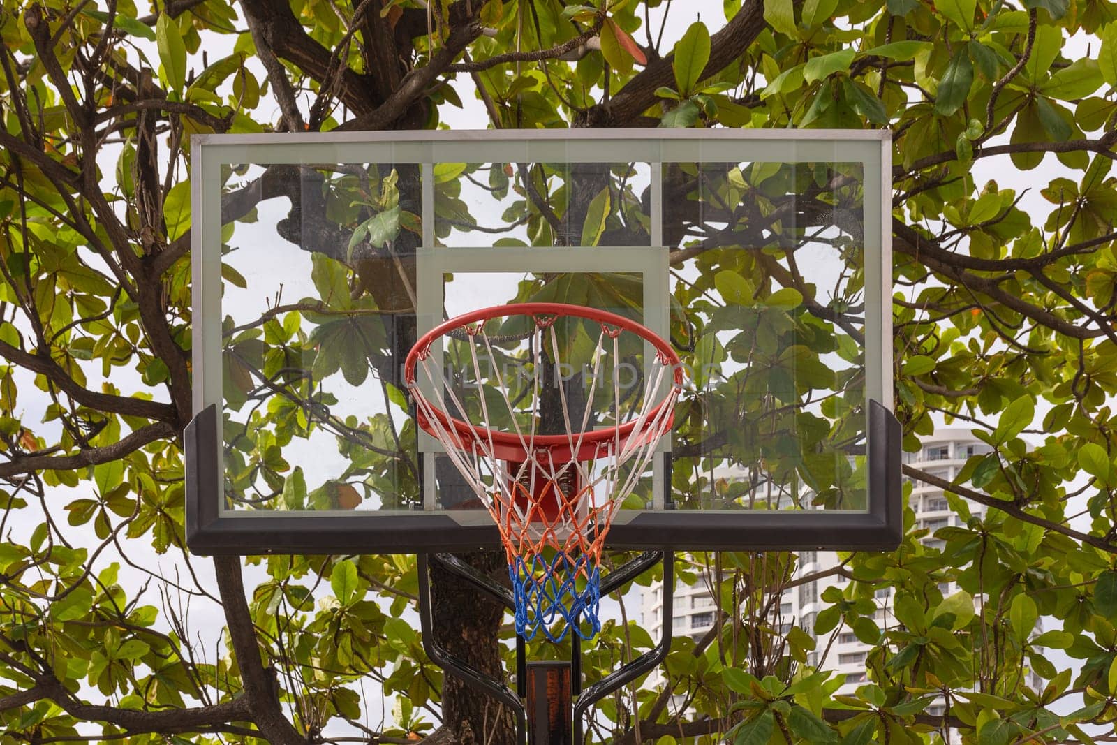 Basketball hoop make by wooden and ball in park