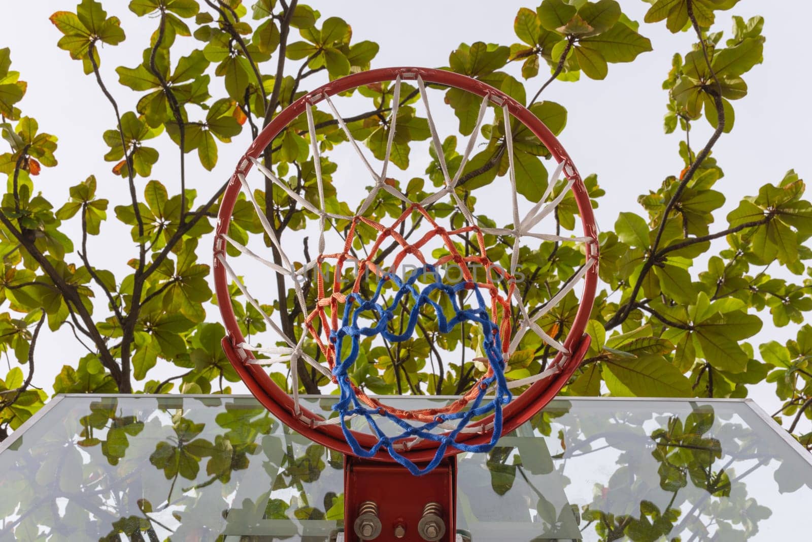Basketball hoop make by wooden and ball in park