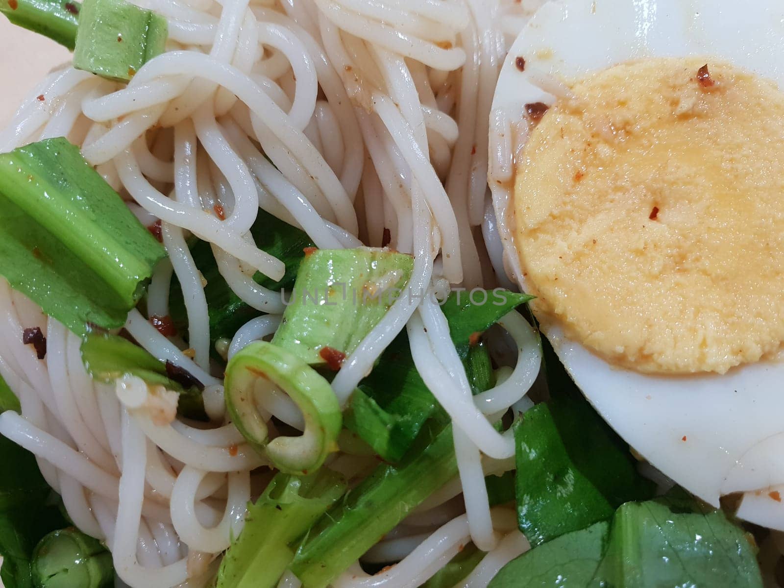 Rice vermicelli noodle spicy salad with mackerel for sale at Thai street food market or restaurant in Thailand