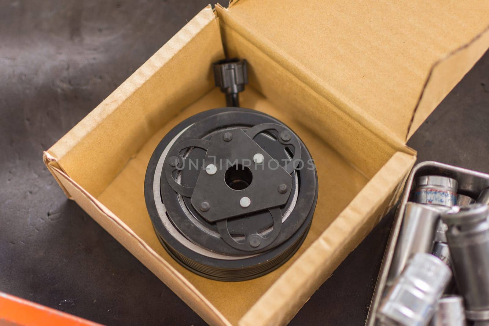 Auto parts of the car in garage wait for repair