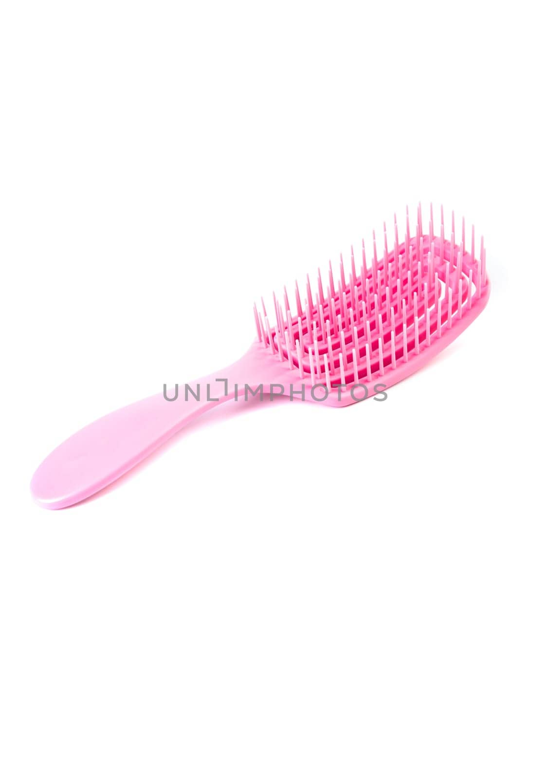 Aroma hair comb for massage of head isolated on white background.