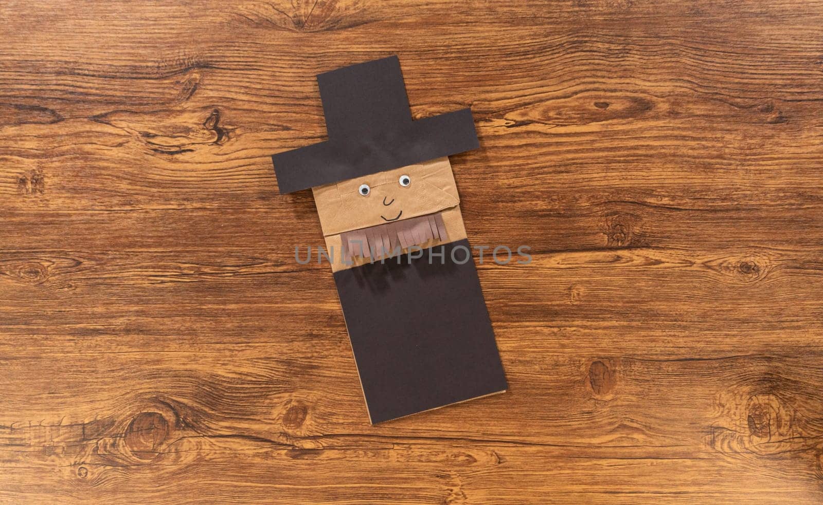 Flat lay. A dedicated teacher brings paper puppets to life, fostering creativity in the classroom through hands-on projects.