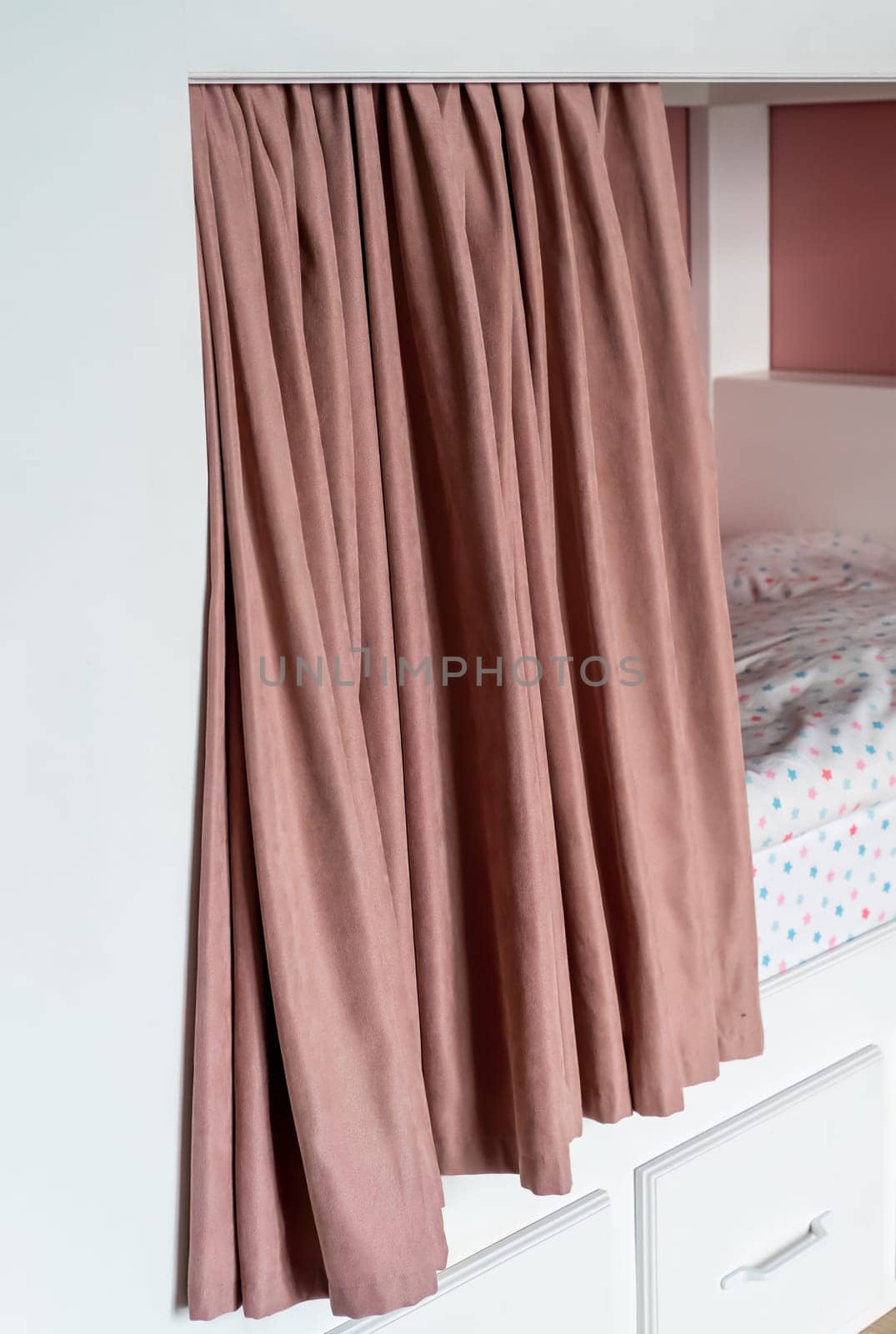 Pink curtains for bunk bed for girls in the bedroom without people