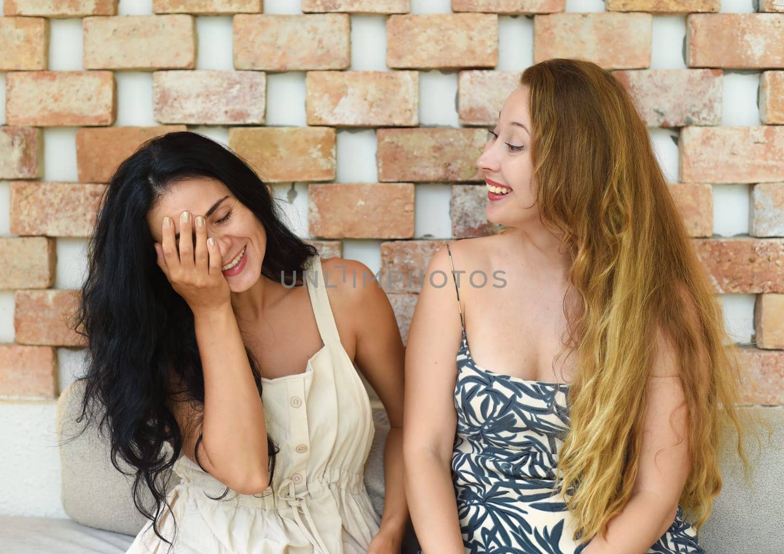 Russian beautiful blonde woman talking with her best friend