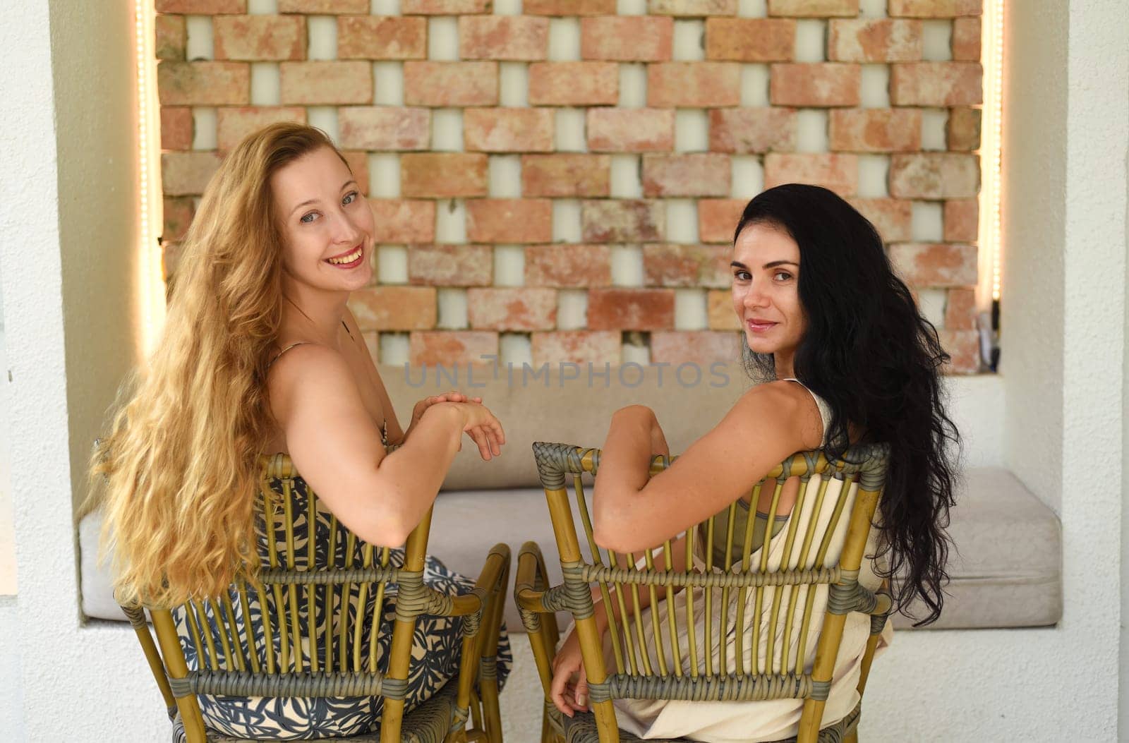 Russian beautiful blonde woman talking with her best friend