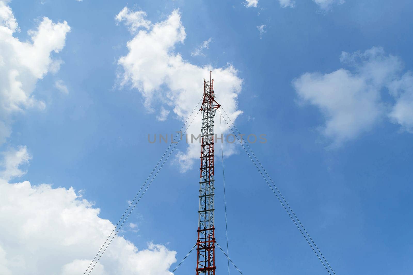 Antenna tower and blue sky with white cloud