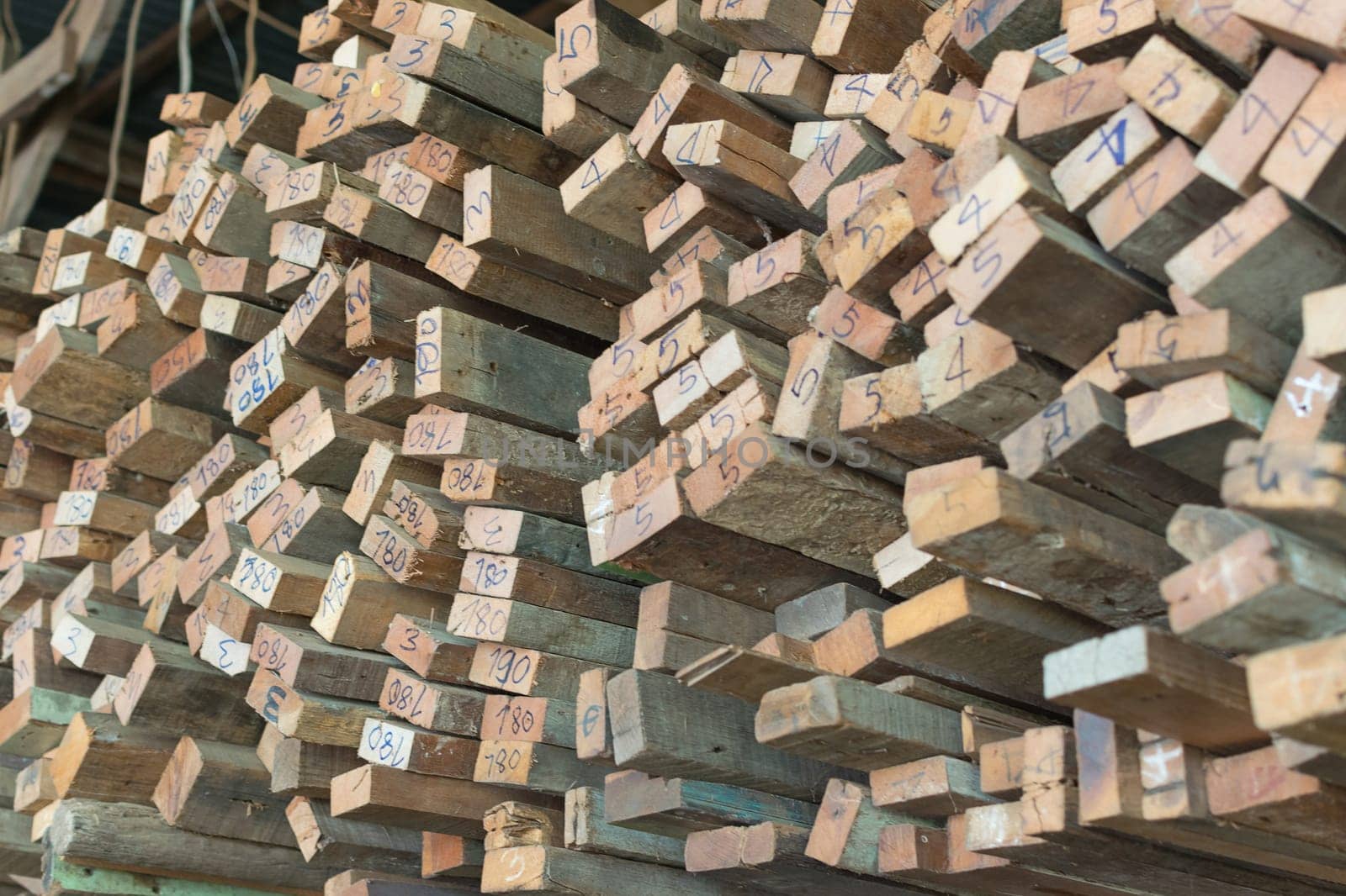 Timber wood from natural hardwood in warehouse for a construction