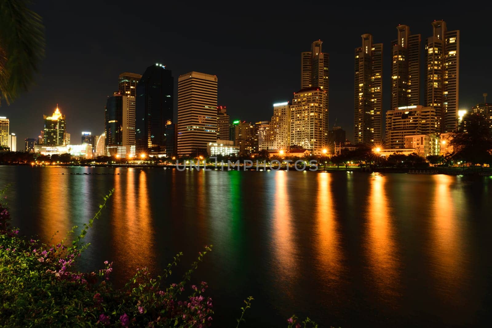 Bangkok, Thailand - June 6, 2015 : Bangkok city night view and Benchakitti Park. Bangkok is the capital and the most populous city of Thailand.