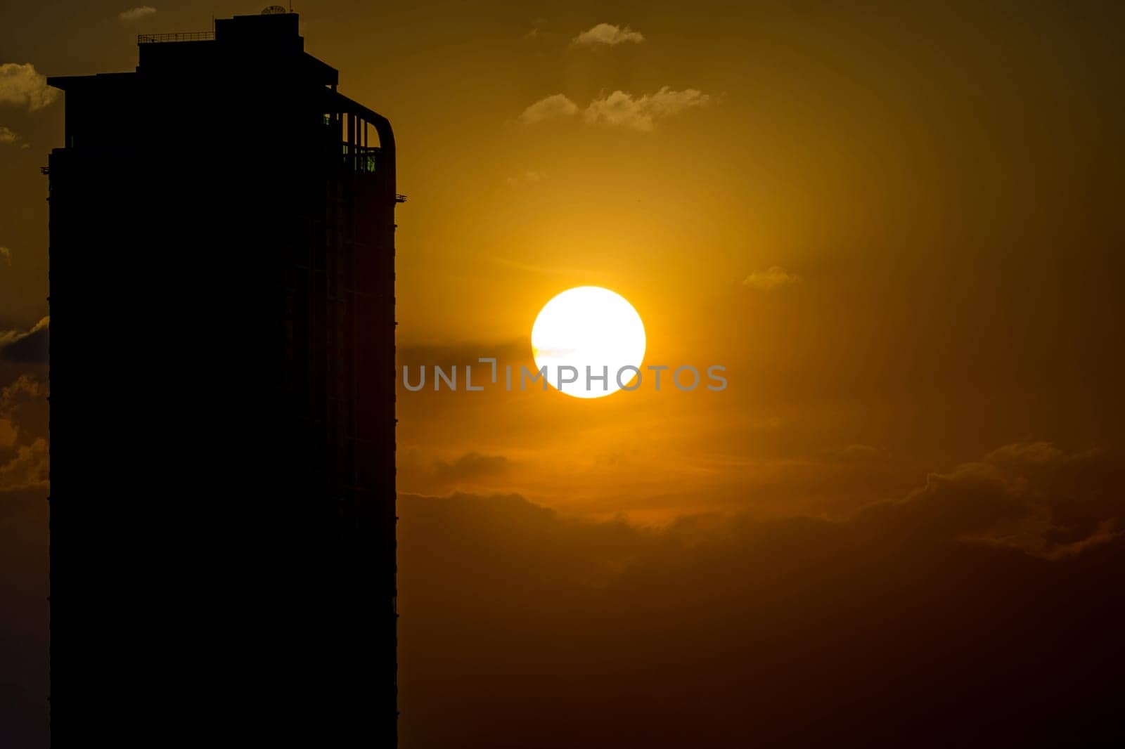Morning Sky with Sunrise and silhouette building in city