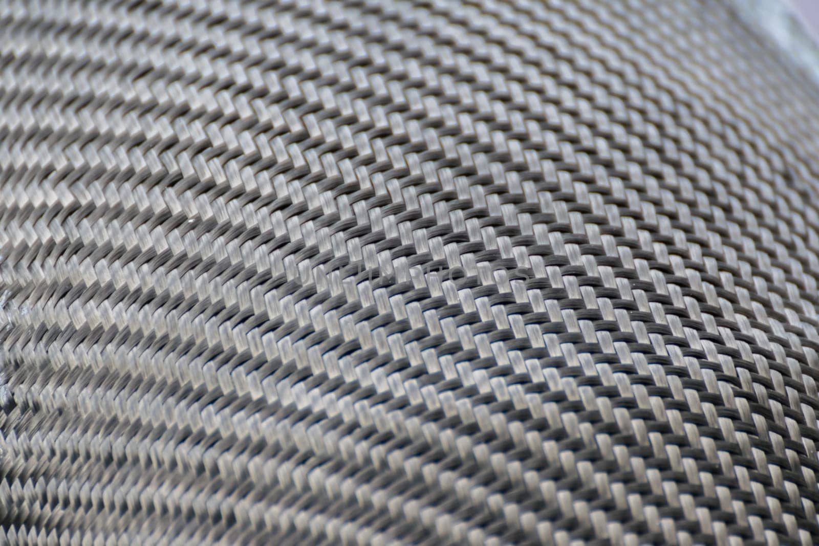 Wrapping carbon fiber or kevlar and man hand for working