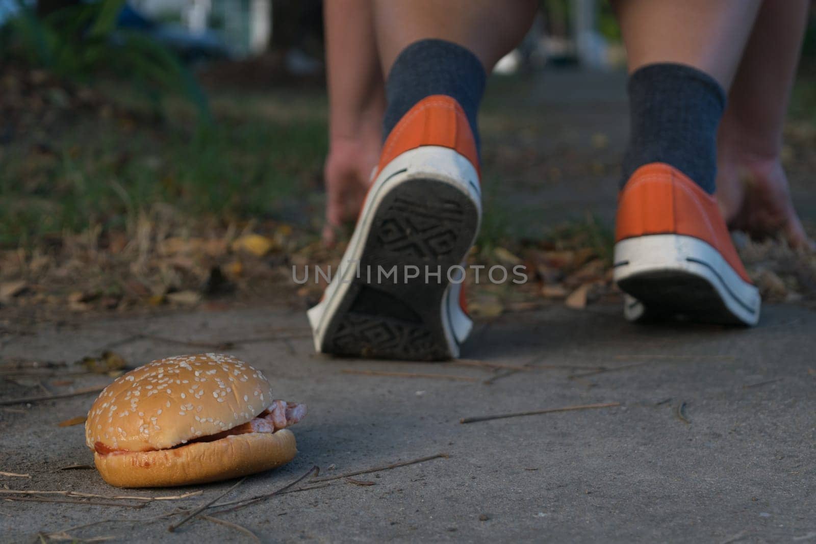 Good bye junk food hamburger left to jogging exercise