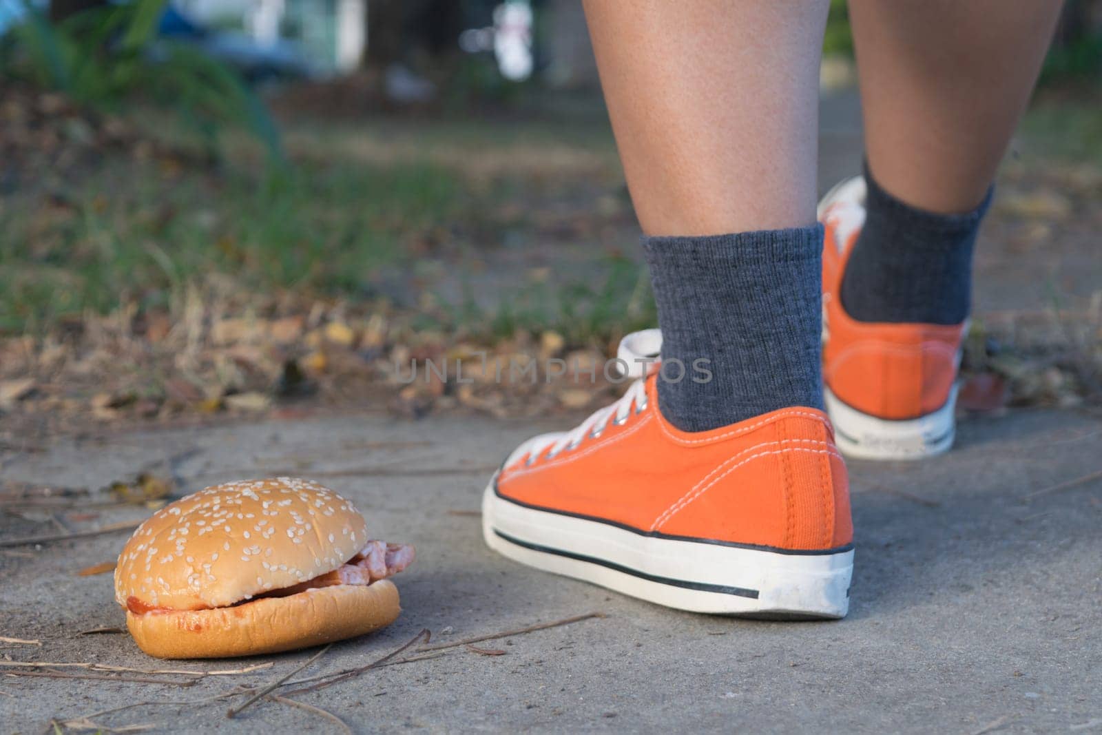 Good bye junk food hamburger left to jogging exercise