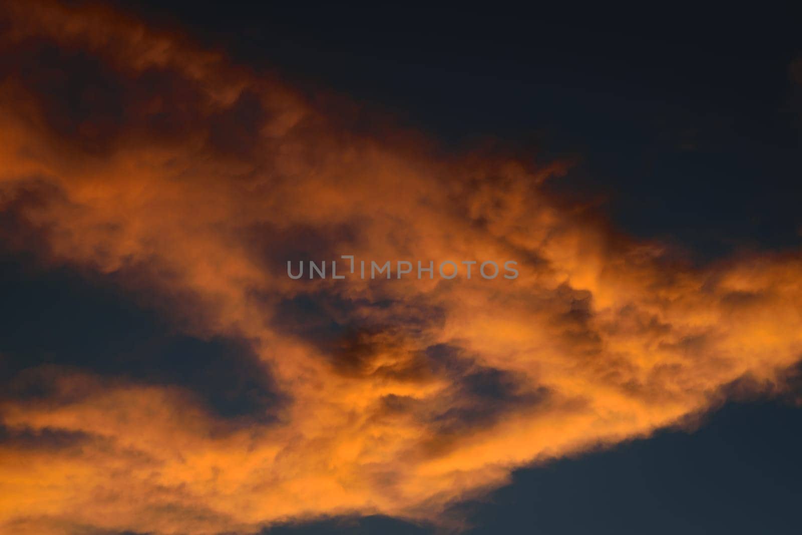 Nature cloudscape with red sky and storm cloud
